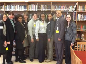 WR and P.S. 221 staff stop to pose for a photo 